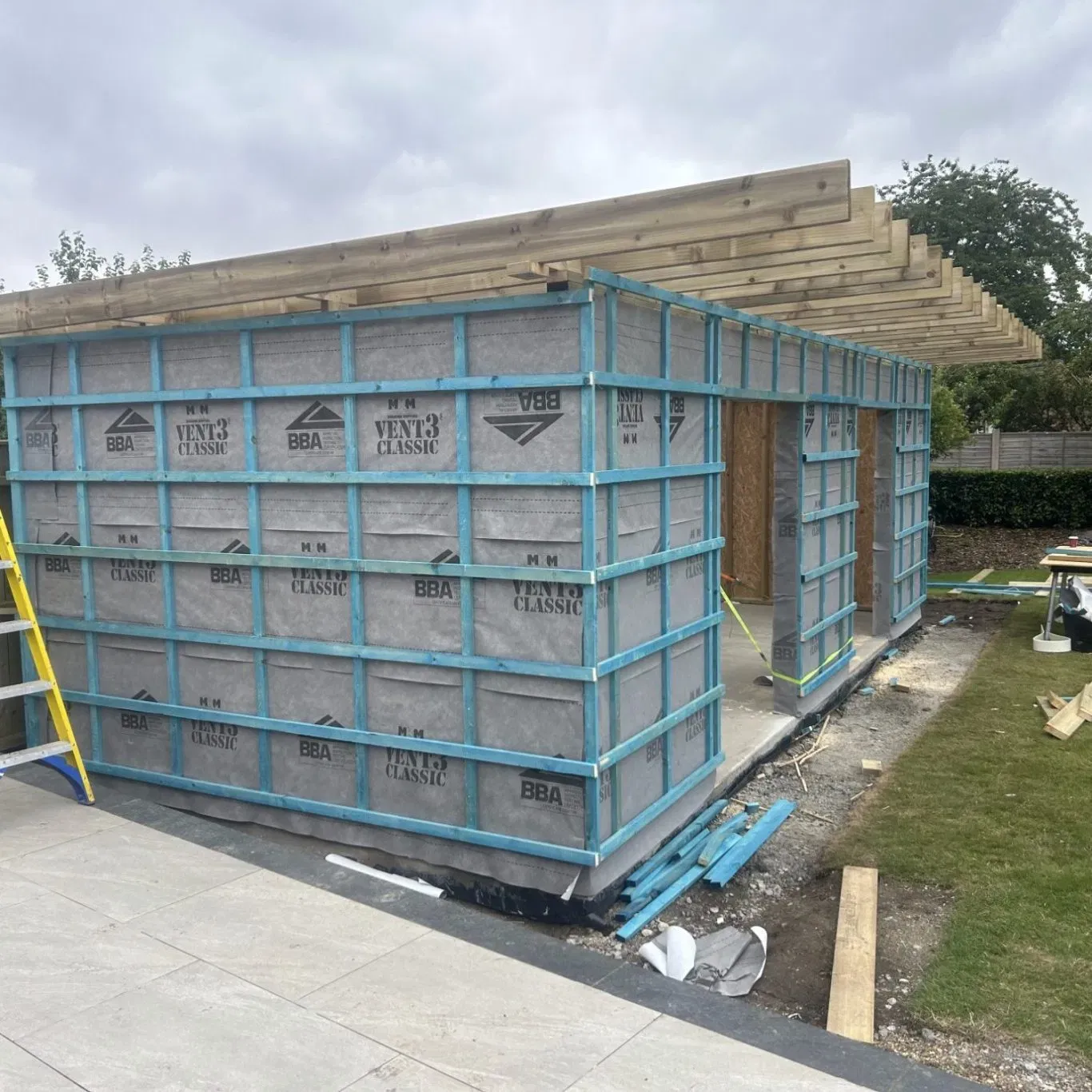 Timber frame of a new family extension under construction